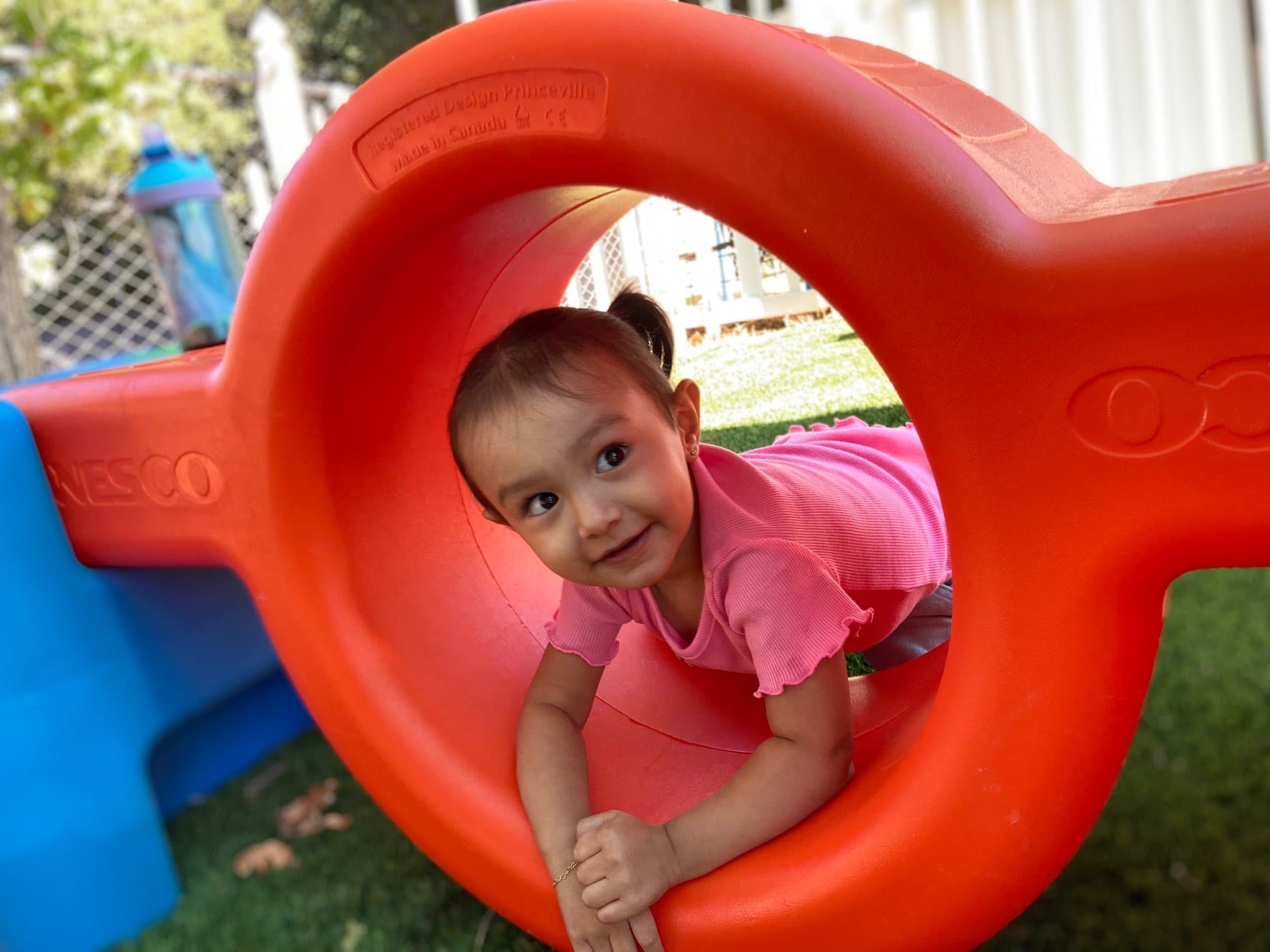 A child playing on Moore Learning's outdoor playground